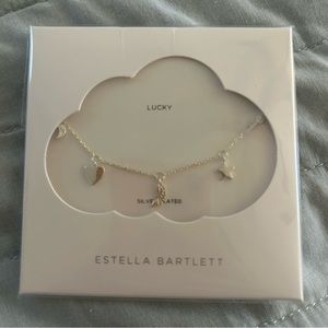 NWT Estella Barnett charm angel wing necklace, silver plated
